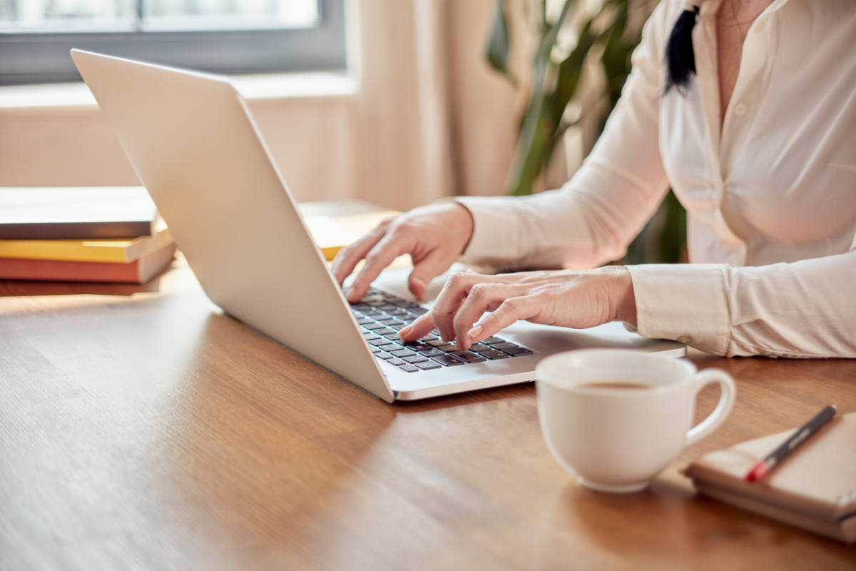 women working on lap top- is too much website content bad for SEO